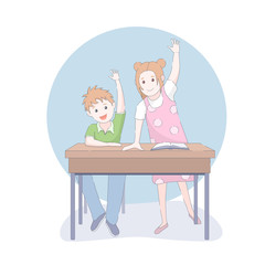 Two smiling young school children arms raised in class