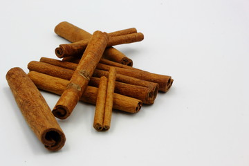 cinnamon sticks on white background