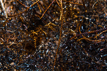 Twisted spirals of metal shavings. Abstract background