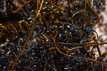 Twisted spirals of metal shavings. Abstract background