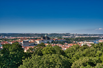 Fototapeta na wymiar Skyline aerial view of Prague old town and red trees. Prague, Czech republic