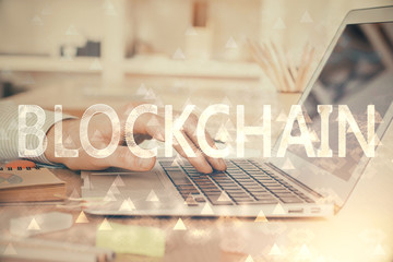 Blockchain theme hud with businessman working on computer on background. Concept of crypto chain....