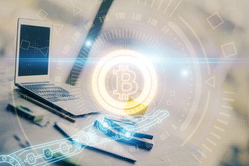 Double exposure of blockchain and crypto economy theme hologram and table with computer background. Concept of bitcoin cryptocurrency.