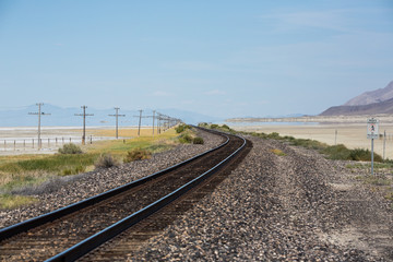 Fototapeta na wymiar Railroad tracks and telephone poles near the Black Rock desert