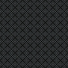 abstract texture of patterned wicker mesh in white on a black background