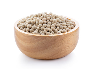 peppercorn in wood bowl isolated on white background. full depth of field
