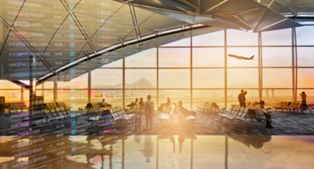 Airport terminal at sunset with passengers. - 282463165