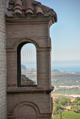 Obraz premium a view of the sea from the top of a house tower