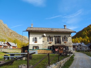 A mountain pasture with its typical houses immersed in the Nature of the Natural Park 