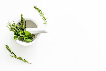 Alternative medicine with medicinal herbs on white background top view mock up