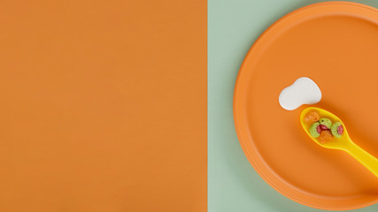 Top view of spoon with cereals and milk