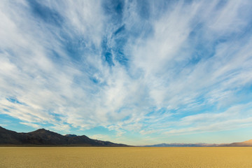Black Rock playa desert at sunrise with a beautiful cloudy sky