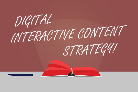 Word writing text Digital Interactive Content Strategy. Business concept for Search engine optimization marketing Color Pages of Open Book photo on Table with Pen and Light Beam Glaring