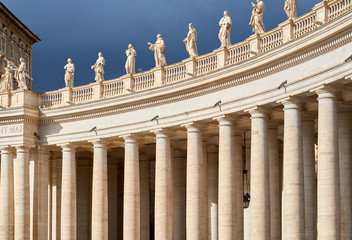 Fototapeta na wymiar Saint Peter's Square details, columns and sculptures in Vatican