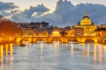 St. Peter's cathedral and Tiber river with high water at evening. Saint Peter Basilica in Vatican...