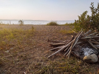 Lined firewood on the lake
