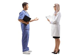Female and male doctor having a conversation