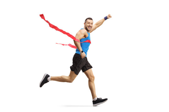 Young Athlete Man On The Finish Line Of A Marathon Race