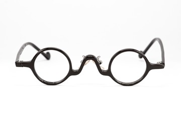 Fototapeta na wymiar Vintage round glasses isolated on white background.