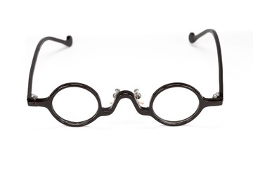 Fototapeta premium Vintage round glasses isolated on white background.