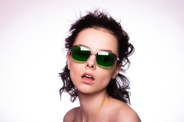 Fototapeta premium beautiful girl in green glasses