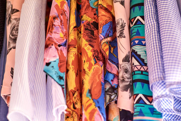 Various multi-colored fabrics. The choice of textiles.