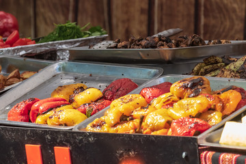 Culinary buffet with takeaway healthy food - meat, pepper, spices, grilled vegetables. Fish and...