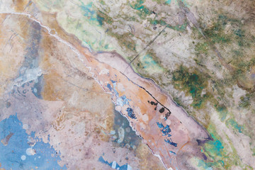 Colorful emulsions on old photographic plate, abstract background or texture