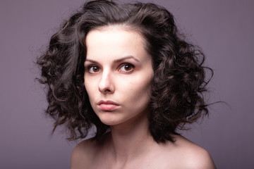 Naklejka premium beautiful young curly girl portrai