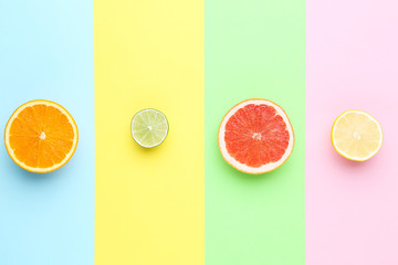 Citrus fruits on colorful background