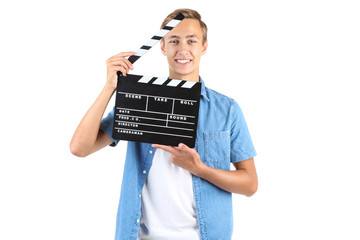 Young man with clapper board isolated on white background