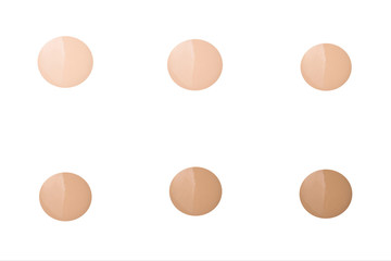 Liquid foundation swatch isolated on white background. Close Up of makeup cream sample.