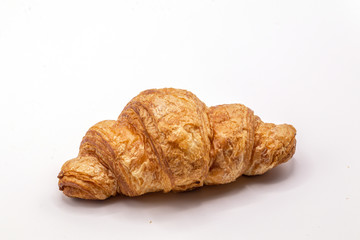 Fresh and tasty buttery croissants isolate on white background.