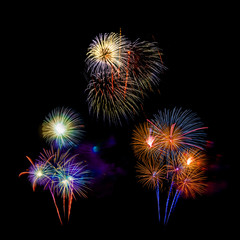 Beautiful colorful isolated firework display for celebration happy new year and merry christmas on black background