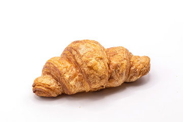 Fresh and tasty buttery croissants isolate on white background.