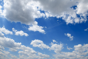 Bright beautiful blue sky with clouds for background or texture