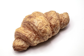 Fresh and tasty buttery croissants isolate on white background.