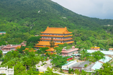 Fototapeta na wymiar View of Po Lin Buddhist monastery at Nong Ping Village in Lantau Island. This is famous place in Hong kong, China