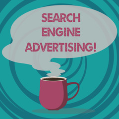 Writing note showing Search Engine Advertising. Business photo showcasing method of placing an online advertisements Mug of Hot Coffee with Blank Color Speech Bubble Steam icon