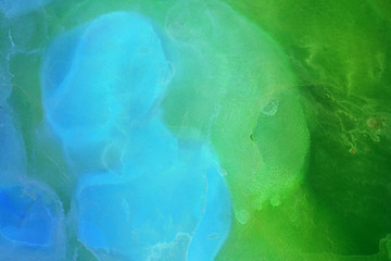 Colorful hand painted ink background. Abstract delicate texture. Contemporary wallpaper.