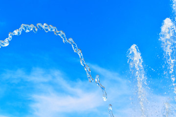 water splashing on blue background