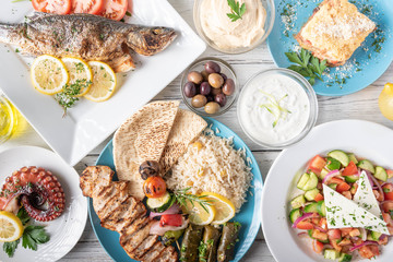assorted popular greek plates with flat lay angle