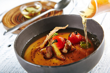 Delicious Mushroom Soup with Garlic and Cherry Tomato
