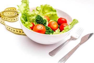 concept diet fresh vegetables on plate at white background