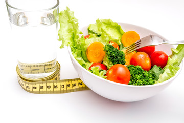 concept diet fresh vegetables on plate at white background