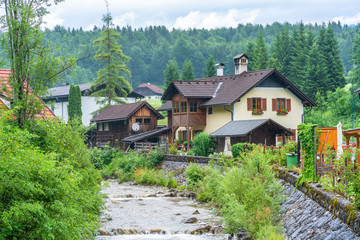 Fototapeta na wymiar Landscape with traditional houses near Bad Goisern, Upper Austria