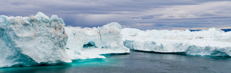 Greenland Iceberg landscape of Ilulissat icefjord with giant icebergs. Icebergs from melting glacier. Arctic nature. © Maridav
