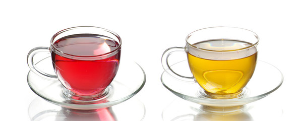 Glass cup of hot aromatic tea on white background