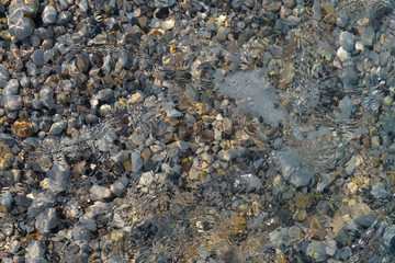 Clear sea water texture. Transparent tropical ocean. Abstract emerald water surface background