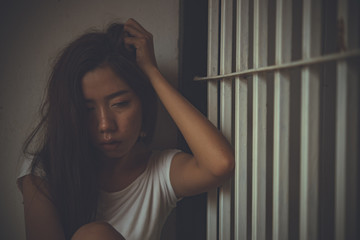 Hands of women desperate to catch the iron prison,prisoner concept,thailand people,Hope to be...